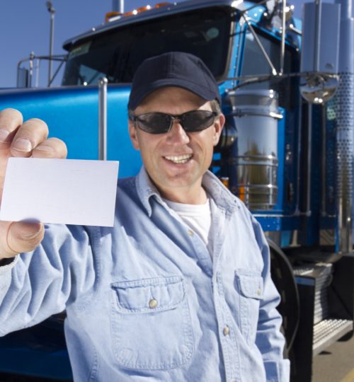 Truck_Driver_Holding_Card