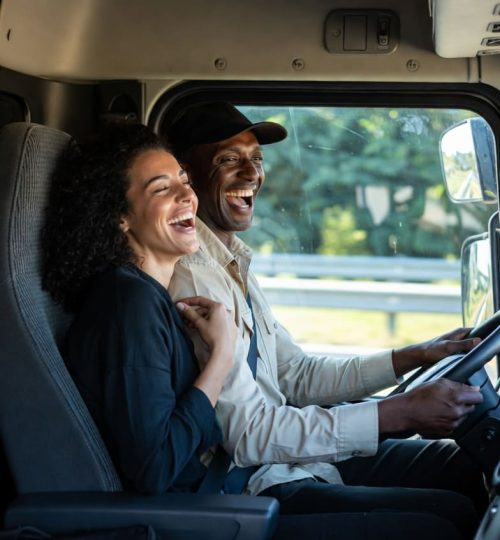 happy truck drivers couple